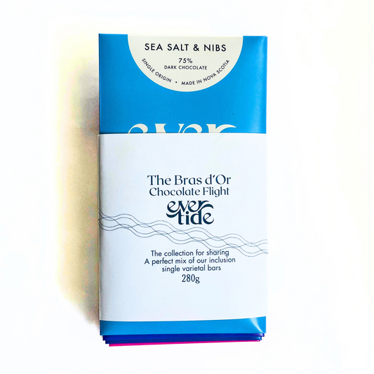 The Bras d'Or Chocolate Flight of four 75% bars, two inclusion and two single varietal, indicating a 250g total weight of 280g.